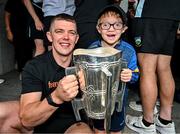 21 July 2025; Captain of All-Ireland Hurling Champions Tipperary, Ronan Maher, left, with Oisin Crowe, aged 12, from Cappawhite, Tipperary, with the Liam MacCarthy Cup at Children's Health Ireland, Crumlin in Dublin after Tipperary won The Liam MacCarthy Cup at Croke Park on Sunday. Photo by Sam Barnes/Sportsfile