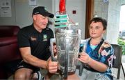 21 July 2025; All-Ireland Hurling Champions Tipperary manager Liam Cahill, left, with Thomas Paul Brophy Barry, aged 10, and the Liam MacCarthy Cup at Children's Health Ireland, Crumlin in Dublin after winning The Liam MacCarthy Cup at Croke Park on Sunday. Photo by Sam Barnes/Sportsfile