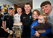 21 July 2025; Naoise Brewer Deegan, aged 14 months, with her mother Leanne Brewer Deegan, pictured with All-Ireland Hurling Champions Tipperary players, from left, Robert Doyle, Jake Morris, Ronan Maher and Conor Stakelum, alongside the Liam MacCarthy Cup at Children's Health Ireland, Crumlin in Dublin after winning The Liam MacCarthy Cup at Croke Park on Sunday. Photo by Sam Barnes/Sportsfile