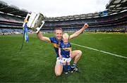 20 July 2025; Noel McGrath of Tipperary and his son Sam celebrate with the Liam MacCarthy cup after his side's victory in the GAA Hurling All-Ireland Senior Championship final match between Cork and Tipperary at Croke Park in Dublin. Photo by Stephen McCarthy/Sportsfile