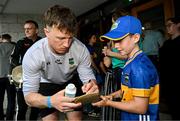 21 July 2025; Tipperary hurler Jake Morris, left, with Tadhg Mahony, aged 10, from Newcastle, Tipperary, at Children's Health Ireland, Crumlin in Dublin after winning The Liam MacCarthy Cup at Croke Park on Sunday. Photo by Sam Barnes/Sportsfile