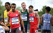 21 July 2025; Jack Raftery, from Castleknock in Dublin, representing Dublin City University and Ireland, centre places his arm around fellow competitor Matthew Galea Soler of Team Malta after finishing first in the men's 400m heats during day five of the FISU World University Games 2025 at Lohrheidestadion in Bochum, Germany. Photo by Shauna Clinton/Sportsfile
