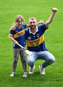 21 July 2025; Tipperary supporters Paul Kelly and his daughter Lucy, from Clonmel, during the homecoming celebrations of the All-Ireland Senior Hurling Champions at FBD Semple Stadium in Thurles, Tipperary. Photo by Piaras Ó Mídheach/Sportsfile