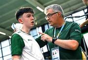 21 July 2025; Luke Marks of Team Ireland with coach Michael O'Meara during his match against Ivan Dzhus of Ukraine in the boy's singles group play stage at Elementary School Nevena Gjeorgjieva Dunja during day one of the 2025 European Youth Summer Olympic Festival in Skopje, North Macedonia. Photo by Tyler Miller/Sportsfile