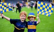 21 July 2025; Tipperary supporters, and brother and sister, Erín Morrissey, aged 7, and Seán Morrissey, aged 5, from Newport, during the homecoming celebrations of the All-Ireland Senior Hurling Champions at FBD Semple Stadium in Thurles, Tipperary. Photo by Piaras Ó Mídheach/Sportsfile
