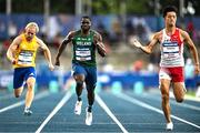 21 July 2025; Toluwabori Akinola, from Balbriggan in Dublin, representing University College Dublin and Ireland, centre, on his way to finishing second in the men's 100m heats during day five of the FISU World University Games 2025 at Lohrheidestadion in Bochum, Germany. Photo by Shauna Clinton/Sportsfile
