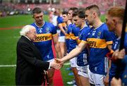 20 July 2025; President of Ireland Michael D Higgins is introduced to Tipperary's John McGrath by captain Ronan Maher before the GAA Hurling All-Ireland Senior Championship final match between Cork and Tipperary at Croke Park in Dublin. Photo by Stephen McCarthy/Sportsfile