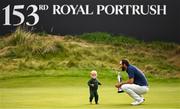 20 July 2025; Scottie Scheffler of USA, with his son Bennett, celebrates with the Claret Jug after winning The 153rd Open Championship at Royal Portrush Golf Club in Portrush, Antrim. Photo by Ramsey Cardy/Sportsfile