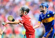 20 July 2025; Páidí Tierney, Church Hill NS, Cuffesgrange, Kilkenny, representing Cork, in action against Cian Harrington, St Mary's SNS, Blessington, Wicklow, representing Tipperary, during the GAA INTO Cumann na mBunscol Respect Exhibition Go Games at the GAA Hurling All-Ireland Senior Championship final match between Cork and Tipperary at Croke Park in Dublin. Photo by Stephen McCarthy/Sportsfile