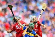 20 July 2025; Bryan O'Shaughnessy, St Anthony's BNS, Ballinlough, Cork, left, Ben O'Riordan, Aghabullogue NS, Aghabullogue, Cork, in action against James Donnelly, St Mary's NS, Stranorlar, Donegal, representing Tipperary, during the GAA INTO Cumann na mBunscol Respect Exhibition Go Games at the GAA Hurling All-Ireland Senior Championship final match between Cork and Tipperary at Croke Park in Dublin. Photo by Stephen McCarthy/Sportsfile