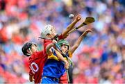 20 July 2025; Bryan O'Shaughnessy, St Anthony's BNS, Ballinlough, Cork, left, Ben O'Riordan, Aghabullogue NS, Aghabullogue, Cork, in action against James Donnelly, St Mary's NS, Stranorlar, Donegal, representing Tipperary, during the GAA INTO Cumann na mBunscol Respect Exhibition Go Games at the GAA Hurling All-Ireland Senior Championship final match between Cork and Tipperary at Croke Park in Dublin. Photo by Stephen McCarthy/Sportsfile
