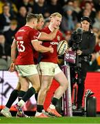 22 July 2025; Jamie Osborne of British & Irish Lions, right, celebrates with teammates Garry Ringrose and Duhan van der Merwe after scoring their side's third try during the tour match between First Nations & Pasifika XV and the British & Irish Lions at Marvel Stadium in Melbourne, Australia. Photo by Brendan Moran/Sportsfile