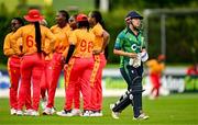 22 July 2025; Ireland batter Amy Hunter leaves the field after being bowled leg before wicket by  Tendai Makusha of Zimbabwe during match two of the Women's T20 International Series between Ireland and Zimbabwe at Pembroke Cricket Club in Dublin. Photo by Sam Barnes/Sportsfile