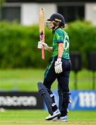 22 July 2025; Ireland batter Gaby Lewis celebrates bringing up her half century during match two of the Women's T20 International Series between Ireland and Zimbabwe at Pembroke Cricket Club in Dublin. Photo by Sam Barnes/Sportsfile