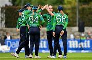 22 July 2025; Ireland bowler Orla Prendergast, centre, celebrates the wicket of Modester Mupachikwa of Zimbabwe with teammates during match two of the Women's T20 International Series between Ireland and Zimbabwe at Pembroke Cricket Club in Dublin. Photo by Sam Barnes/Sportsfile