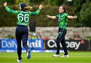 22 July 2025; Ireland bowler Orla Prendergast, right,  and teammate Gaby Lewis celebrate the wicket of Modester Mupachikwa of Zimbabwe, caught by Amy Hunter, not pictured, during match two of the Women's T20 International Series between Ireland and Zimbabwe at Pembroke Cricket Club in Dublin. Photo by Sam Barnes/Sportsfile