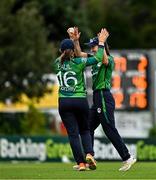 22 July 2025; Leah Paul of Ireland, left, celebrates with teammate Arlene Kelly after catching out Kelis Ndhlovu of Zimbabwe during match two of the Women's T20 International Series between Ireland and Zimbabwe at Pembroke Cricket Club in Dublin. Photo by Sam Barnes/Sportsfile