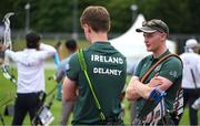 22 July 2025; Rogan Cunningham, from Killinkere in Cavan, representing Technological University Dublin and Ireland, left, speaks to team-mate Sam Delaney during the men's compound individual qualification on day six of the FISU World University Games 2025 at Sportpark Am Hallo Stadion in Essen, Germany. Photo by Shauna Clinton/Sportsfile