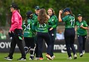 22 July 2025; Cara Murray of Ireland, centre, celebrates with teammates after catching out Francisca Chipare of Zimbabwe during match two of the Women's T20 International Series between Ireland and Zimbabwe at Pembroke Cricket Club in Dublin. Photo by Sam Barnes/Sportsfile