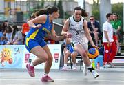 22 July 2025; Helena Keane of Team Ireland in action against Andrada Jaba of Romania during the girls 3x3 Group C match between Team Ireland and Romania during day two of the 2025 European Youth Summer Olympic Festival at East Gate Mall in Skopje, North Macedonia. Photo by Tyler Miller/Sportsfile
