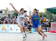22 July 2025; Muireann Teahan of Team Ireland in action against Ioana Savu of Romania during the girls 3x3 Group C match between Team Ireland and Romania during day two of the 2025 European Youth Summer Olympic Festival at East Gate Mall in Skopje, North Macedonia. Photo by Tyler Miller/Sportsfile
