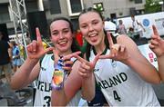 22 July 2025; Helena Keane, left, and Muireann Teahan of Team Ireland after their victory in the girls 3x3 Group C match between Team Ireland and Romania during day two of the 2025 European Youth Summer Olympic Festival at East Gate Mall in Skopje, North Macedonia. Photo by Tyler Miller/Sportsfile