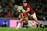 22 July 2025; Kurtley Beale of First Nations & Pasifika XV is tackled by Ben White of British & Irish Lions during the tour match between First Nations & Pasifika XV and the British & Irish Lions at Marvel Stadium in Melbourne, Australia. Photo by Brendan Moran/Sportsfile