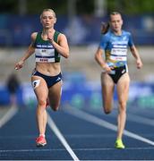 23 July 2025; Lauren Roy, from Ballymena in Antrim, representing Tarleton State University and Ireland, left, on her way to finishing second in the women's 200m during day seven of the FISU World University Games 2025 at Lohrheidestadion in Bochum, Germany. Photo by Shauna Clinton/Sportsfile
