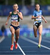 23 July 2025; Lauren Roy, from Ballymena in Antrim, representing Tarleton State University and Ireland, left, on her way to finishing second in the women's 200m during day seven of the FISU World University Games 2025 at Lohrheidestadion in Bochum, Germany. Photo by Shauna Clinton/Sportsfile