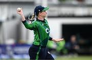 23 July 2025; Ireland fielder Louise Little fields the ball during match three of the Women's T20 International Series between Ireland and Zimbabwe at Sydney Parade in Dublin. Photo by Seb Daly/Sportsfile