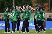 23 July 2025; Ireland players celebrate dismissing Zimbabwe batter Modester Mupachikwa, not pictured, during match three of the Women's T20 International Series between Ireland and Zimbabwe at Sydney Parade in Dublin. Photo by Seb Daly/Sportsfile