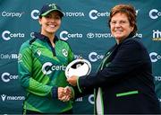 23 July 2025; Ireland's Amy Hunter is presented with the Player of the Match award by Cricket Ireland president Donna Armstrong after match three of the Women's T20 International Series between Ireland and Zimbabwe at Sydney Parade in Dublin. Photo by Seb Daly/Sportsfile