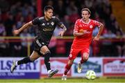 23 July 2025; Matheus Silva of Qarabag in action against Harry Wood of Shelbourne during the UEFA Champions League Second Qualifying Round first leg match between Shelbourne and Qarabag FK at Tolka Park in Dublin. Photo by Stephen McCarthy/Sportsfile