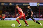 23 July 2025; James Norris of Shelbourne in action against Leandro Andrade of Qarabag during the UEFA Champions League Second Qualifying Round first leg match between Shelbourne and Qarabag FK at Tolka Park in Dublin. Photo by Stephen McCarthy/Sportsfile