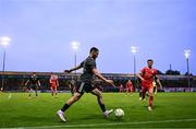 23 July 2025; Abbas Hüseynov of Qarabag in action against Sean Boyd of Shelbourne during the UEFA Champions League Second Qualifying Round first leg match between Shelbourne and Qarabag FK at Tolka Park in Dublin. Photo by Stephen McCarthy/Sportsfile