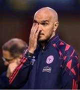 23 July 2025; Shelbourne head coach Joey O'Brien dejected after his side's defeat in the UEFA Champions League Second Qualifying Round first leg match between Shelbourne and Qarabag FK at Tolka Park in Dublin. Photo by Stephen McCarthy/Sportsfile