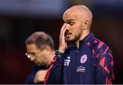 23 July 2025; Shelbourne head coach Joey O'Brien dejected after his side's defeat in the UEFA Champions League Second Qualifying Round first leg match between Shelbourne and Qarabag FK at Tolka Park in Dublin. Photo by Stephen McCarthy/Sportsfile