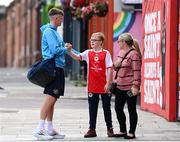 24 July 2025; St Patrick's Athletic's Chris Forrester is greeted by supporters before the UEFA Conference League Second Qualifying Round first leg match between St Patrick's Athletic and Nomme Kalju FC at Richmond Park in Dublin. Photo by Stephen McCarthy/Sportsfile