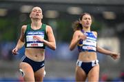 24 July 2025; Lauren Roy, from Ballymena in Antrim, representing Tarleton State University and Ireland, left, after finishing fourth in the semi-final of the women's 200m during day eight of the FISU World University Games 2025 at Lohrheidestadion in Bochum, Germany. Photo by Shauna Clinton/Sportsfile
