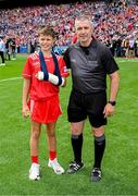 20 July 2025; Referee Liam Gordon is presented with the match ball by Ben Lynch, from Portumna, before the GAA Hurling All-Ireland Senior Championship final match between Cork and Tipperary at Croke Park in Dublin. Photo by Ray McManus/Sportsfile