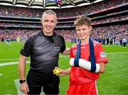 20 July 2025; Referee Liam Gordon is presented with the match ball by Ben Lynch, from Portumna, before the GAA Hurling All-Ireland Senior Championship final match between Cork and Tipperary at Croke Park in Dublin. Photo by Ray McManus/Sportsfile
