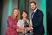 25 July 2025; Lifetime Achievement Award Recipient and former Waterford footballer Aine Wall is presented with her award by GPA Player Development Manager Jennifer Rogers, left, and GPA Chief Executive Tom Parsons, during the GPA Legends Lunch at Croke Park in Dublin. Photo by Sam Barnes/Sportsfile