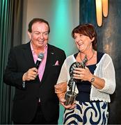 25 July 2025; Lifetime Achievement Award Recipient and former Waterford footballer Aine Wall is interviewed by MC Marty Morrissey during the GPA Legends Lunch at Croke Park in Dublin. Photo by Sam Barnes/Sportsfile