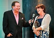 25 July 2025; Lifetime Achievement Award Recipient and former Waterford footballer Aine Wall is interviewed by MC Marty Morrissey during the GPA Legends Lunch at Croke Park in Dublin. Photo by Sam Barnes/Sportsfile