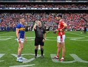 20 July 2025; The two captains, Ronan Maher of Tipperary and Robert Downey of Cork, watch as referee Liam Gordon tosses a coin before the GAA Hurling All-Ireland Senior Championship final match between Cork and Tipperary at Croke Park in Dublin. Photo by Ray McManus/Sportsfile