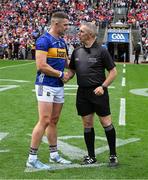 20 July 2025; Captain Ronan Maher of Tipperary shakes hands with referee Liam Gordon before the GAA Hurling All-Ireland Senior Championship final match between Cork and Tipperary at Croke Park in Dublin. Photo by Ray McManus/Sportsfile