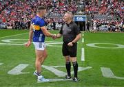 20 July 2025; Captain Ronan Maher of Tipperary shakes hands with referee Liam Gordon before the GAA Hurling All-Ireland Senior Championship final match between Cork and Tipperary at Croke Park in Dublin. Photo by Ray McManus/Sportsfile
