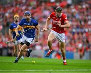 20 July 2025; Robert Downey of Cork in action against John McGrath of Tipperary during the GAA Hurling All-Ireland Senior Championship final match between Cork and Tipperary at Croke Park in Dublin. Photo by Ray McManus/Sportsfile