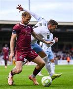 25 July 2025; Stephen Walsh of Galway United in action against Andy Boyle of Waterford during the SSE Airtricity Men's Premier Division match between Galway United and Waterford at Eamonn Deacy Park in Galway. Photo by Piaras Ó Mídheach/Sportsfile