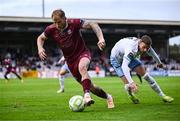 25 July 2025; Stephen Walsh of Galway United gets away from Andy Boyle of Waterford during the SSE Airtricity Men's Premier Division match between Galway United and Waterford at Eamonn Deacy Park in Galway. Photo by Piaras Ó Mídheach/Sportsfile